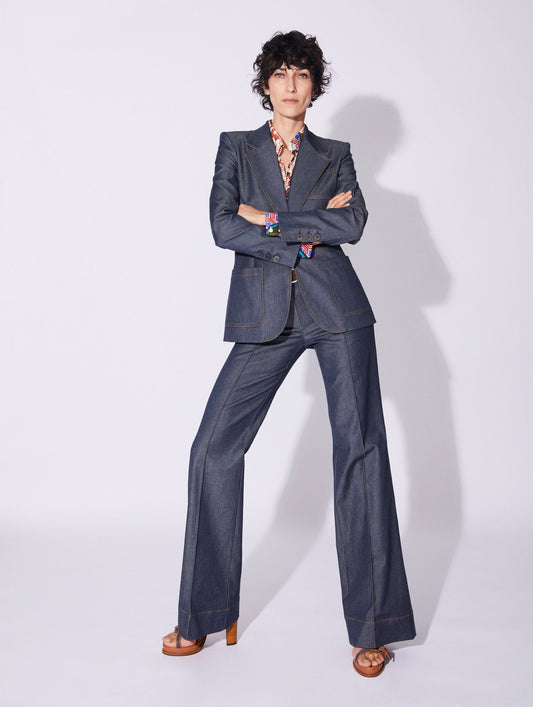 Blue washed denim flared trousers