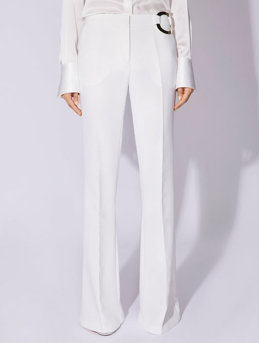 White crepe flared trousers with buckle