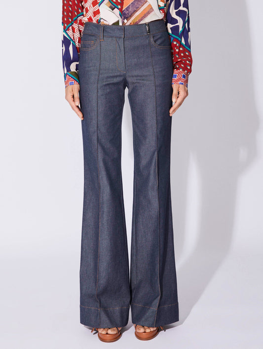 Blue washed denim flared trousers
