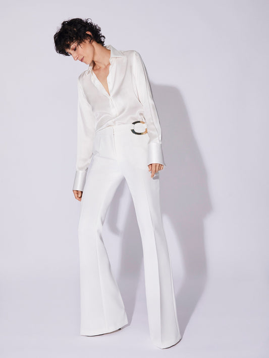 White crepe flared trousers with buckle 