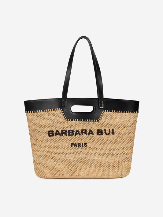 Shopping bag in natural raffia and black leather