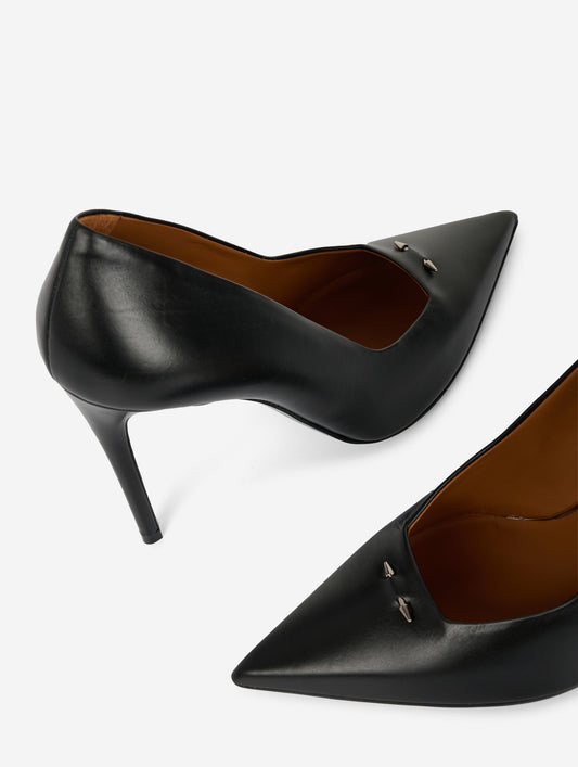 Black leather pumps