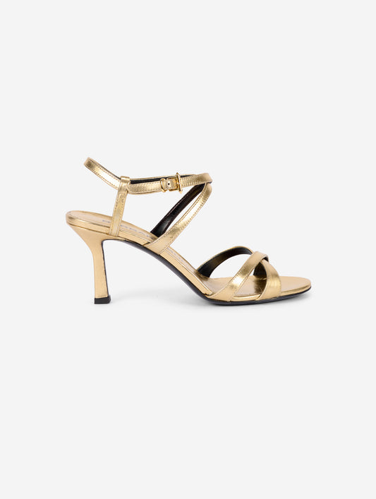 Sandals in gold metallic leather