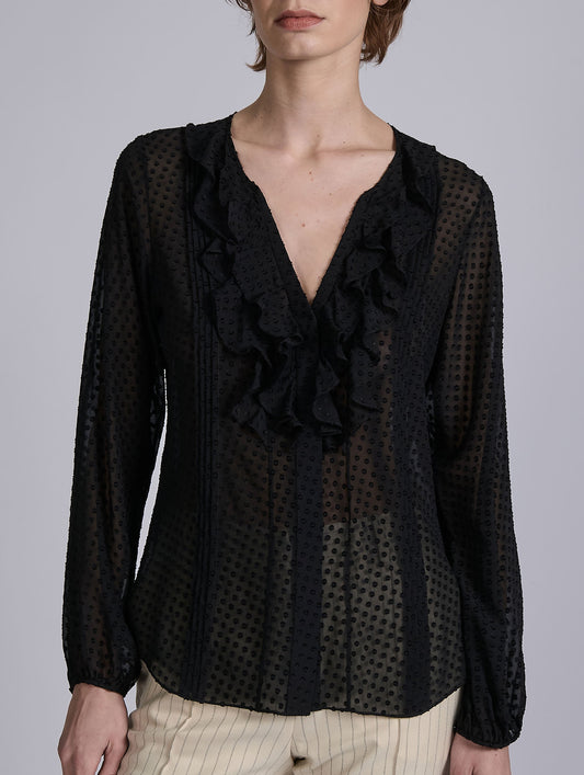 Black ruffled blouse in jacquard plumetis
