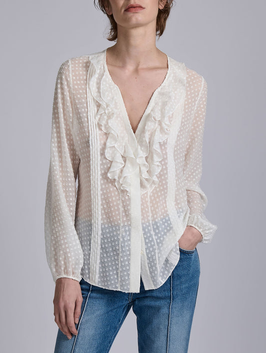 White ruffled blouse in jacquard plumetis
