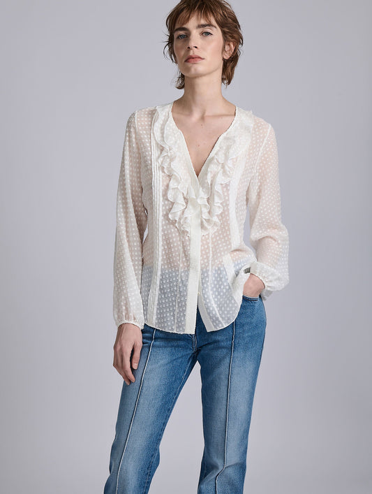 White ruffled blouse in jacquard plumetis
