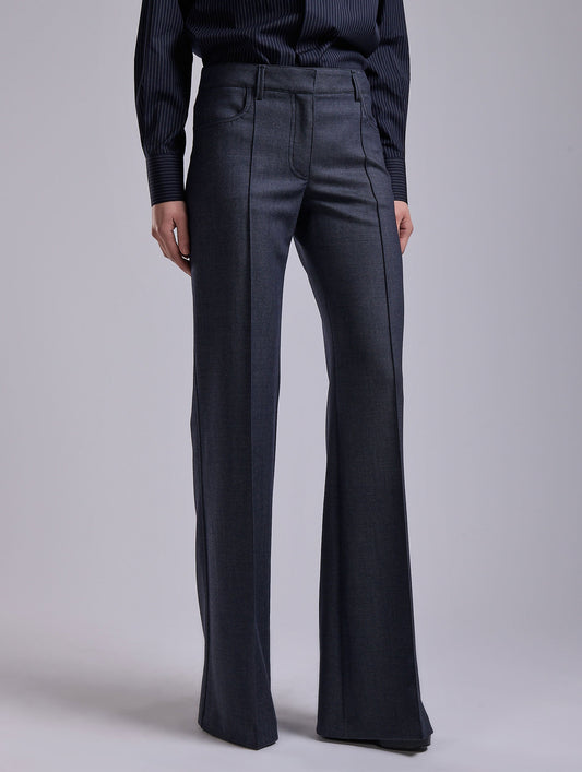 Flared Super 100 wool denim effect trousers