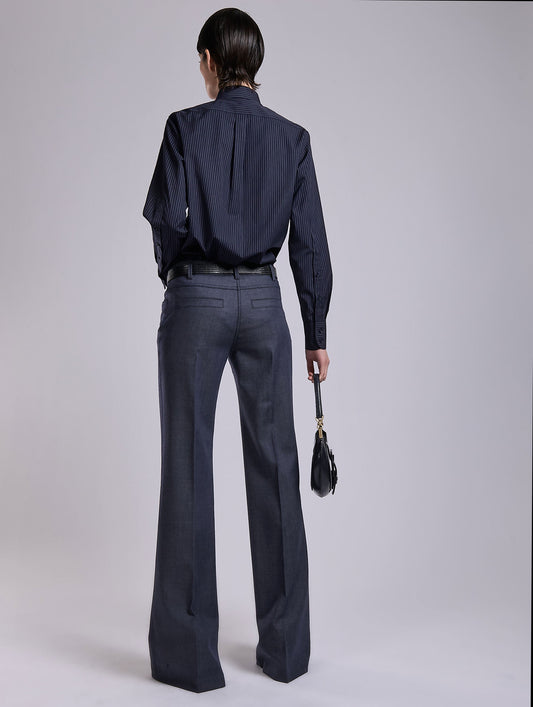 Flared Super 100 wool denim effect trousers