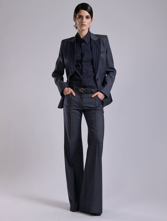 Flared Super 100 wool denim effect trousers