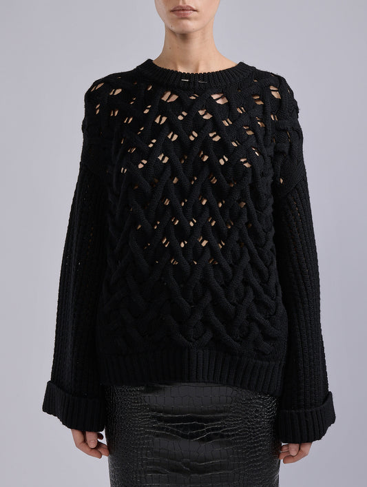Black merino wool cable-knit sweater