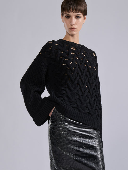 Black merino wool cable-knit sweater