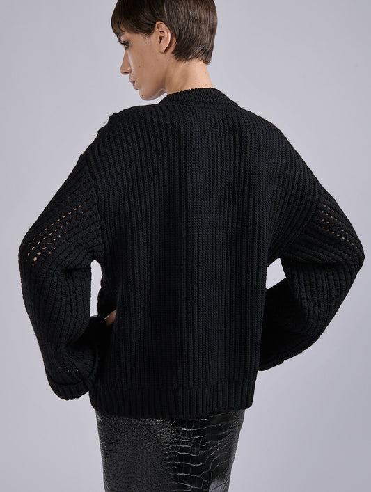 Black merino wool cable-knit sweater