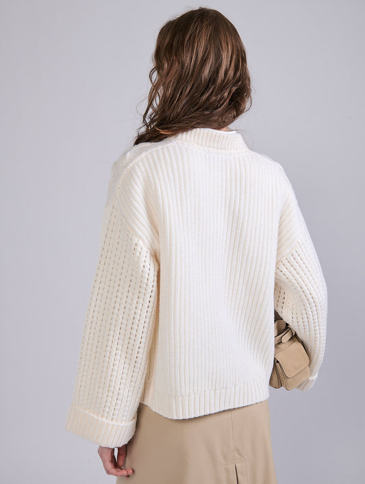 Ivory merino wool cable-knit sweater