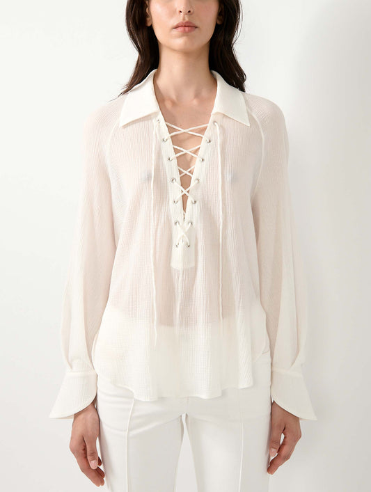 White crepon blouse with laced neckline