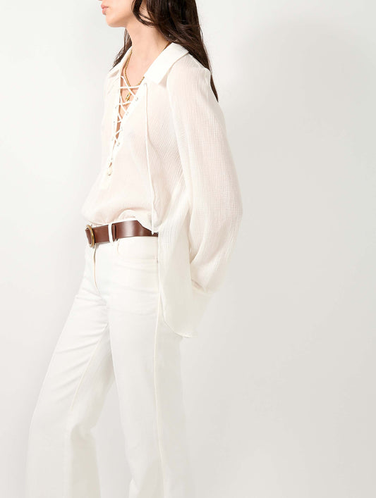 White crepon blouse with laced neckline