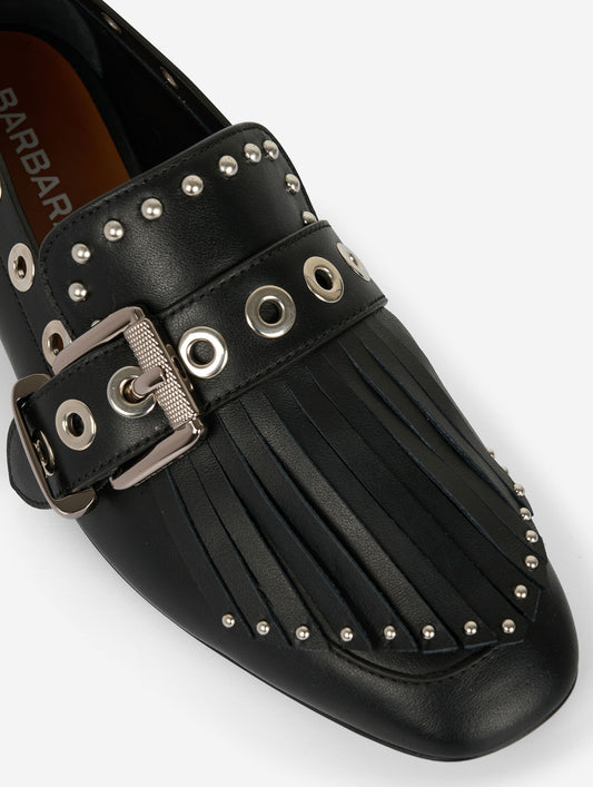 Black leather fringed and studded loafers