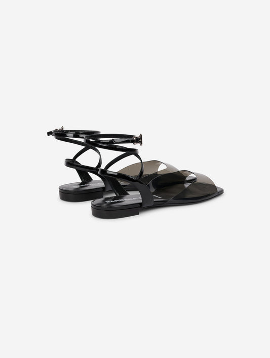 Sandales en plexi fumé et cuir verni noir