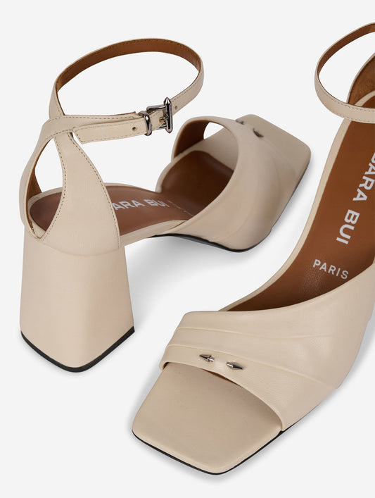 Asymmetrical ivory leather sandals