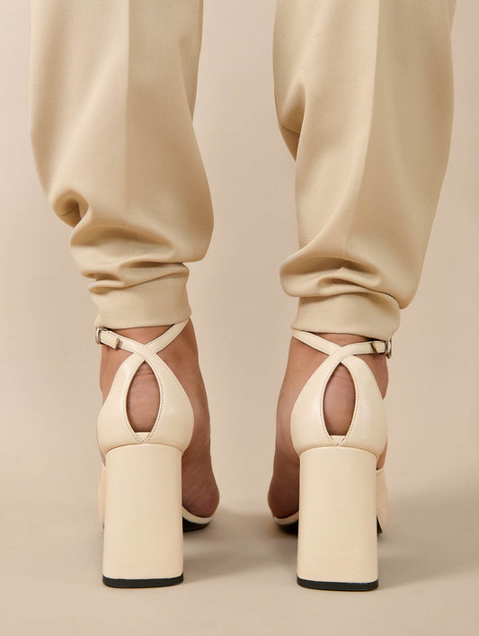 Asymmetrical ivory leather sandals