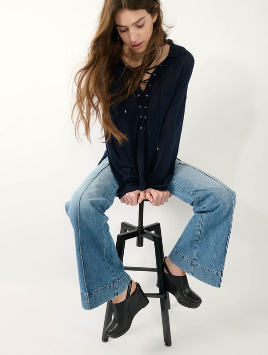 Sabots compensées en cuir noir