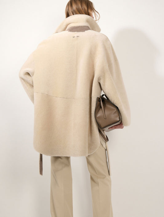 Manteau en peau lainée réversible taupe