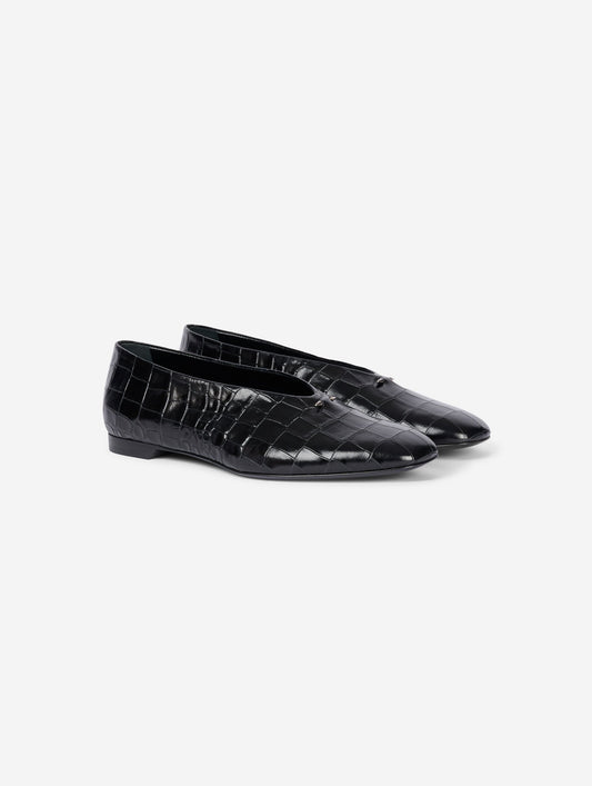 Black embossed leather ballet flats