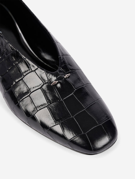 Black embossed leather ballet flats