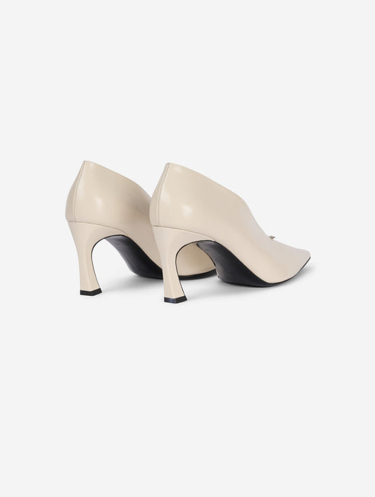 Ivory leather comma-heel pumps