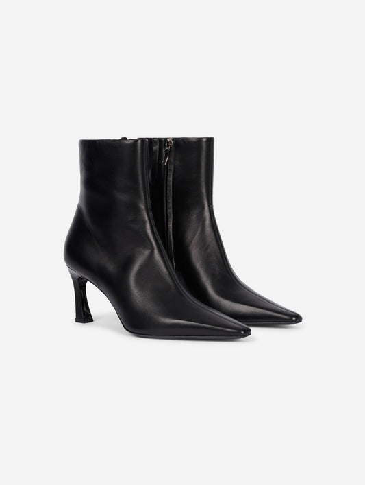 Boots zippés talon virgule en cuir noir