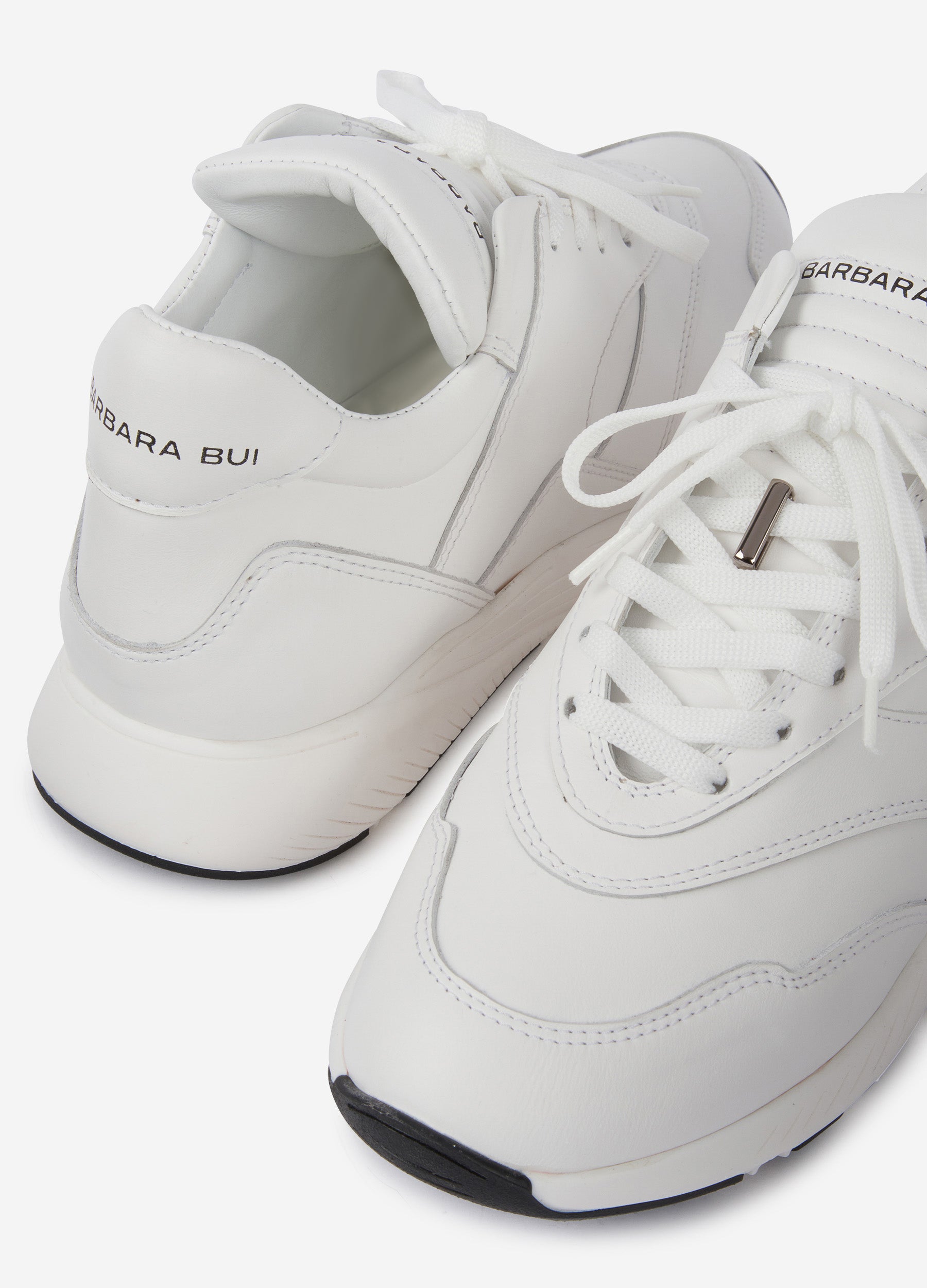 All white cheap leather running shoes